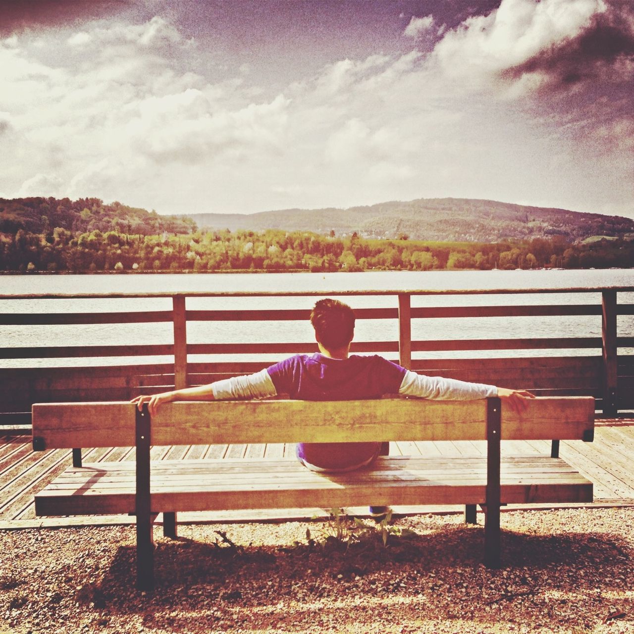 sky, cloud - sky, railing, built structure, cloud, wood - material, bench, architecture, cloudy, day, outdoors, building exterior, nature, tranquility, absence, fence, sunlight, tranquil scene, no people, chair