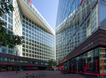 Low angle view of skyscrapers against sky