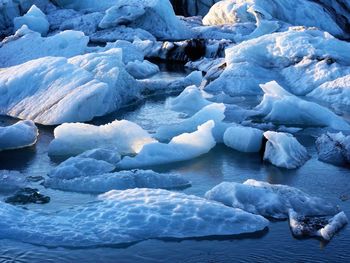 Scenic view of ice floating on water