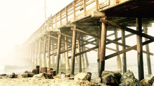 High angle view of bridge over sea against sky