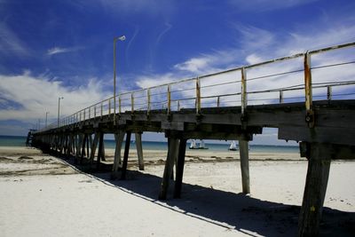 Bridge over sea against sky