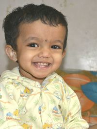 Close-up portrait of smiling boy