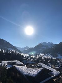 Scenic view of mountains against clear sky during winter