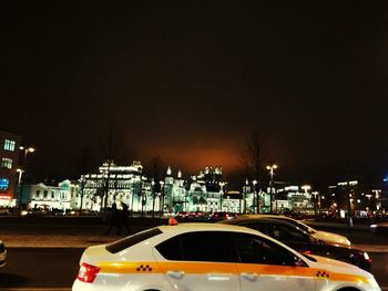 Traffic on city street at night