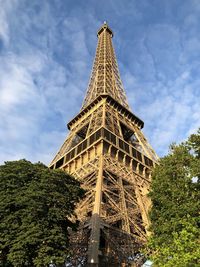 Low angle view of historical building against cloudy sky