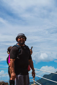 Full length of man standing against sky