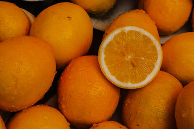 Full frame shot of oranges at market stall