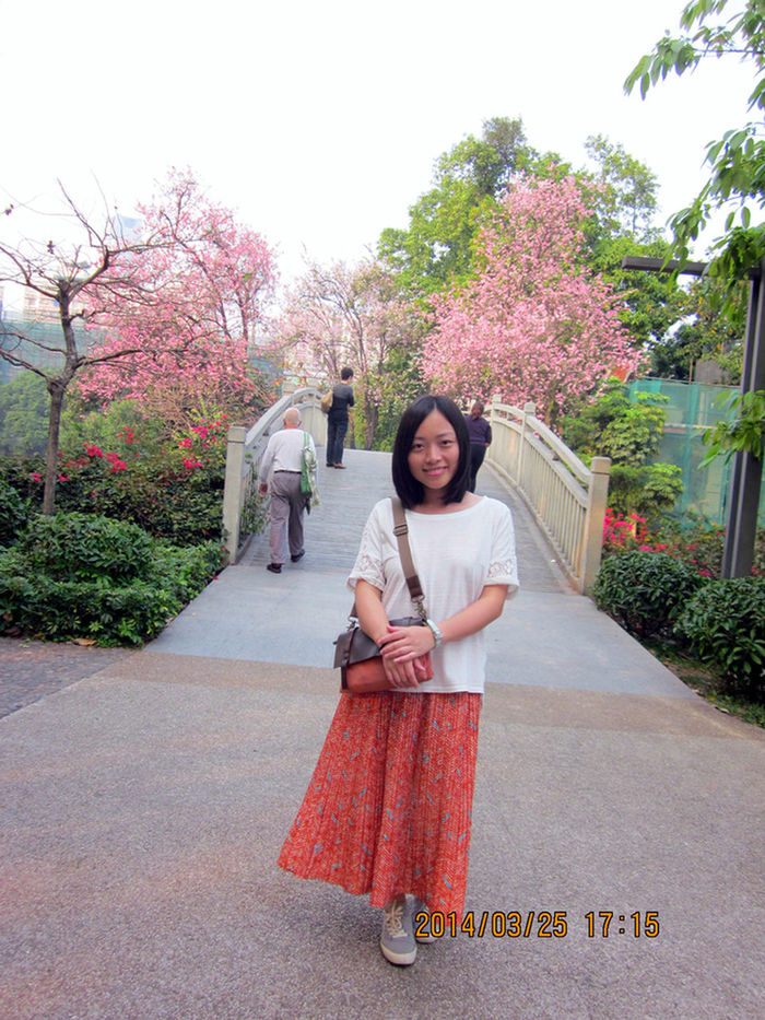 tree, person, front view, full length, lifestyles, casual clothing, flower, looking at camera, leisure activity, sitting, portrait, childhood, smiling, park - man made space, day, standing, girls, growth