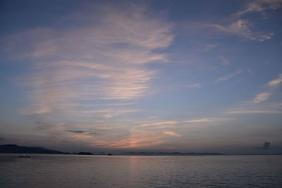 Scenic view of sea against sky at sunset