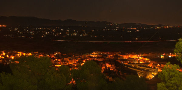 High angle view of illuminated city at night