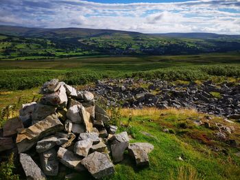 Scenic view of land against sky