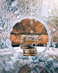 Close-up of water falling from faucet