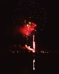 Firework display at night