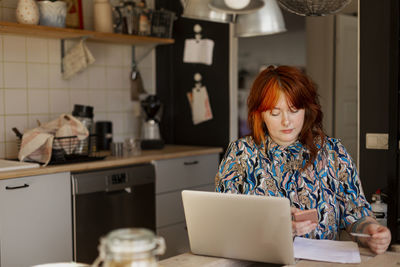 Woman using laptop