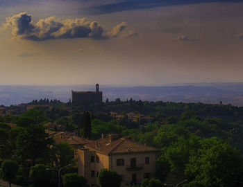 High angle view of buildings against sky at sunset