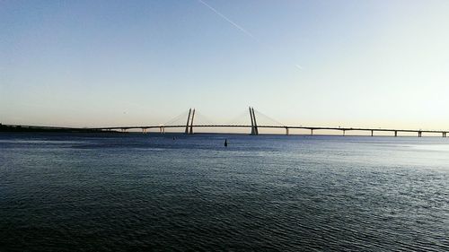 View of suspension bridge against clear sky