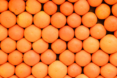 Full frame shot of orange fruits in market