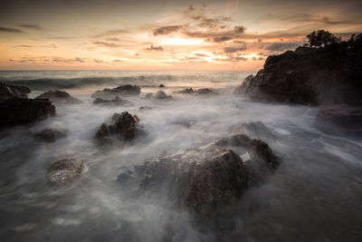 Scenic view of sea against sky during sunset