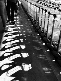 Low section of people walking on footpath