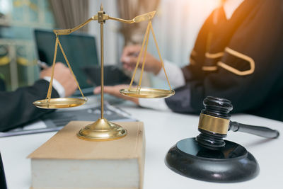 Close-up of candles on table