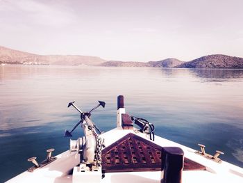 Nautical vessel on sea against sky