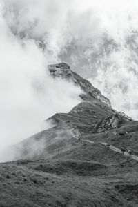 Scenic view of volcanic mountain against sky