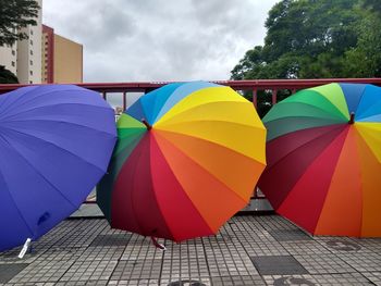 Multi colored umbrella against sky