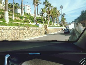 Road seen through car windshield