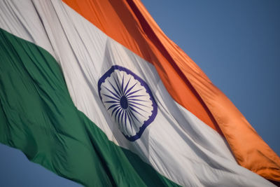 India flag flying high at connaught place with pride in blue sky, india flag fluttering, indian flag