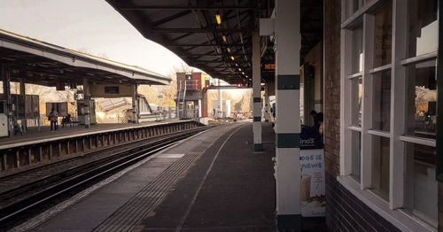 Railroad station platform in city