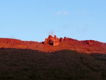 Low angle view of mountain against clear sky