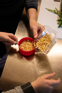 Midsection of woman preparing food