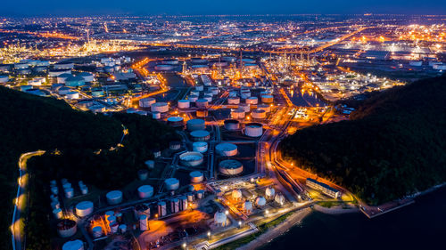 High angle view of illuminated cityscape at night