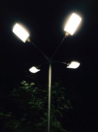 Low angle view of illuminated street light