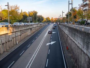 Road amidst buildings in city