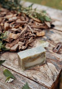 Making handmade natural soaps on an old wooden table