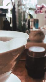 Close-up of coffee cup on table