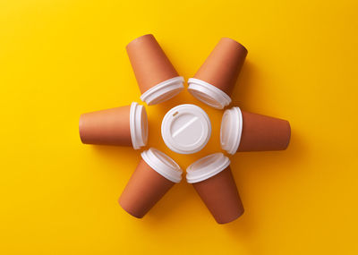 High angle view of yellow and orange on white background