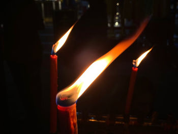 Close-up of burning candle