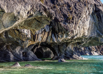 Scenic view of rock formation in sea