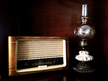 Close-up of telephone booth on table