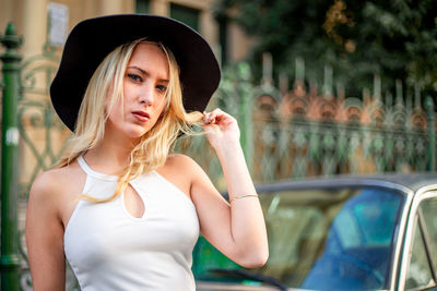Portrait of young woman looking away