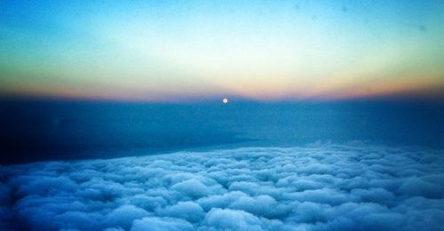 Scenic view of sea against sky at sunset