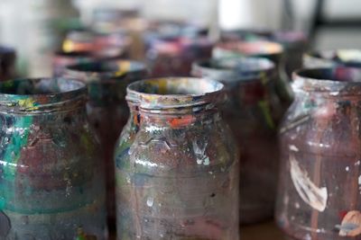 Close-up of painted bottles