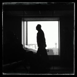 Full length of woman standing in pond