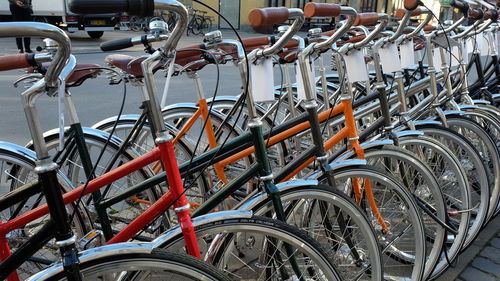 Close-up of bicycles in parking lot