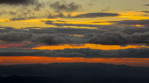 Low angle view of dramatic sky during sunset