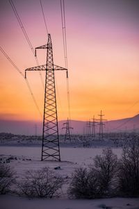 Electric towers on the sunset in the north of russia