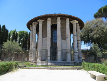 Low angle view of historical building against blue sky