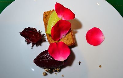 Close-up of red flowers in water